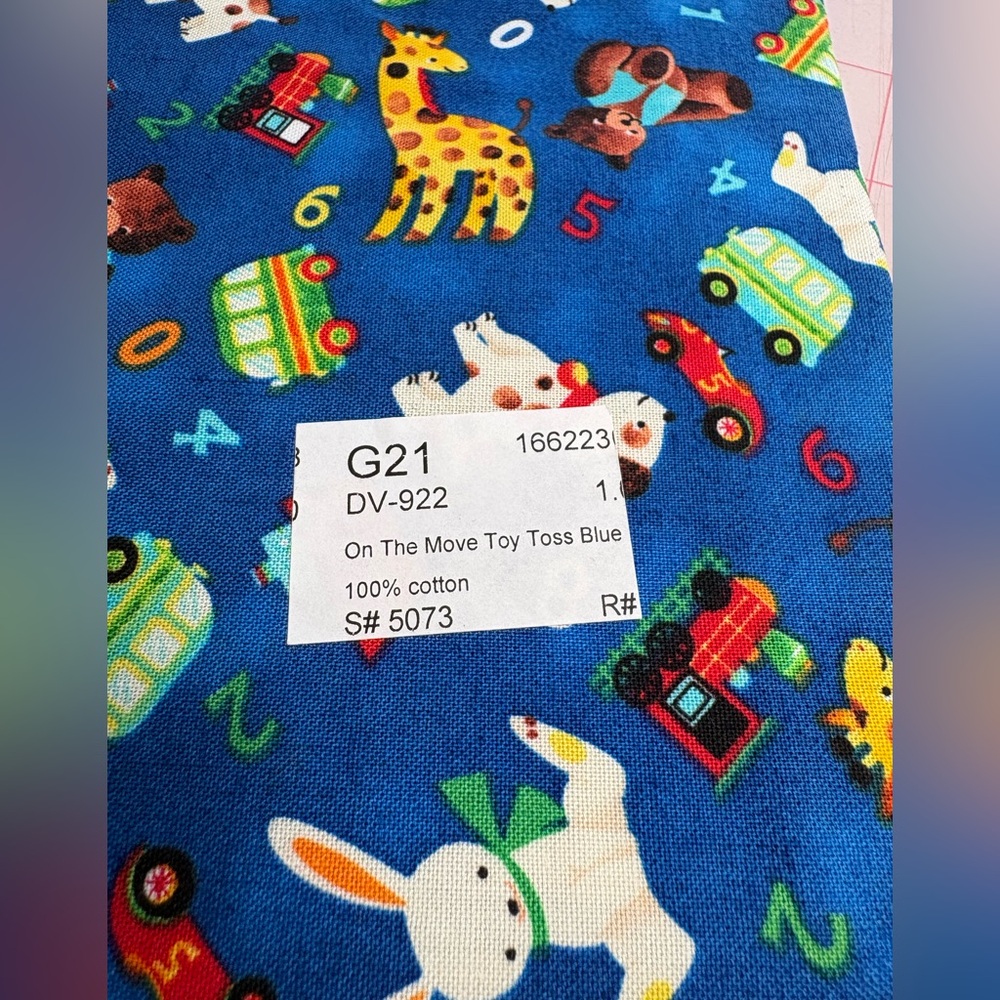 On The Move Toy Toss Blue Fabric - 1 yard cut
